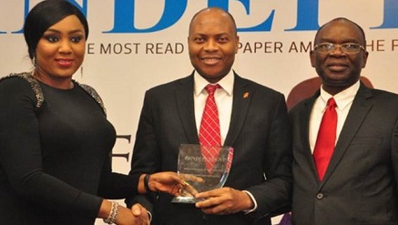 l-r: Director, Independent Newspapers, Adaobi Nwakuche, presenting the award of the Most Innovative Bank won by UBA Plc  to the Divisional Head, Digital and Consumer Banking, United Bank for Africa( UBA) Plc, Mr Yinka Adedeji while Managing Director, Independent Newspapers, Mr. Ted Iwere looks on,  at the Independent Newspapers Awards,  held  in Lagos at weekend